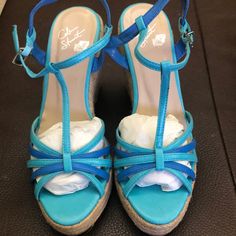 Brand New Never Worn. Color Is Turquoise. Strappy Wedge, Jute Heel, Approx 4” High. Gorgeous Summer Wedge. Blue Synthetic Wedge Sandals With Ankle Strap, Blue Wedge Heel Sandals With 4-inch Heel, Blue Synthetic Ankle Strap Wedge Sandals, Blue Platform Wedge Sandals With Ankle Strap, Blue Wedge Sandals With Platform And Round Toe, Blue Platform Wedge Sandals With Round Toe, Blue Closed Toe Synthetic Wedge Sandals, Blue Platform Wedge Heels, Blue Platform Heels With Wedge Heel