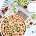 an overhead view of a bowl of mexican food