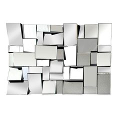 a mirror that is on top of a white wall and has many mirrors all over it