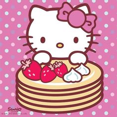 a hello kitty birthday cake with strawberries on the top and pink polka dot background