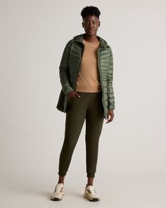 Currently on the need-now list: our Lightweight Down Packable Long Puffer Jacket. It looks good anytime casual is in order and is super versatile for outdoor adventures. With stretchy fleece side panels for effortless flex, convenient two-way zippers, and a water-repellent and wind-resistant fabric, this jacket is designed to keep you comfy and warm in a bunch of weather conditions. Plus, it's easily packable for on-the-go.  | Quince | Women's Lightweight Down Packable Long Puffer Jacket in Lode Functional Green Outerwear For Travel, Green Outerwear With Ribbed Cuffs For Outdoor, Casual Recycled Polyester Puffer Jacket For Winter, Casual Winter Puffer Jacket In Recycled Polyester, Recycled Polyester Spring Outerwear For Outdoor, Casual Spring Puffer Jacket For Outdoor Activities, Casual Recycled Polyester Outerwear For Spring, Casual Packable Outerwear, Spring Outdoor Outerwear In Recycled Polyester