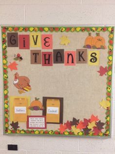 a bulletin board that says give thanks