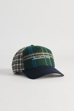 Patchwork plaid cap by Standard Cloth. Essential baseball hat with a curved brim in an adjustable fit with strap closure. Urban Outfitters exclusive. Features Standard Cloth plaid Roscoe hat Essential baseball cap Patchwork plaid Adjustable fit Strap closure UO exclusive Content + Care 100% Cotton Spot clean Imported Size Circumference: Adjustable | Standard Cloth Plaid Roscoe Hat in Blue at Urban Outfitters Collegiate Cotton Hat For Streetwear, Plaid Cap One Size Fits Most, Casual Plaid Hat With Curved Brim, Retro Wool Baseball Cap, Adjustable Plaid Hat With Curved Brim, Plaid Adjustable Curved Brim Hat, Casual Plaid Flat Cap, Adjustable Plaid Cap, Adjustable Plaid Flat Cap