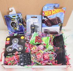 a box filled with toys and other items