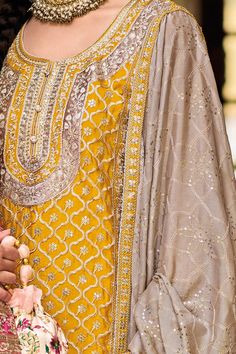 This Yellow Gold Chinon Silk Embroidered Traditional Palazzo Suit provides the elegance needed for weddings, parties or other festive occasions. The kameez boasts intricate embroidery, zari and sequins detailing, accompanied by a chinon silk embroidered palazzo pants and embroidered chinon silk dupatta. 3 piece Kameez chinon silk with heavy embroidery, zari work & sequin work Palazzo chinon silk with embroidery front and back, zari work & sequin work Dupatta chinon silk with embroidery, zari wor Phulkari Pants, Lucknowi Kurta, Gharara Suits, Patiala Salwar Suits, Bridal Dupatta, Phulkari Dupatta, Chikankari Suits, Velvet Shawl, Patiala Suit