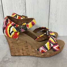 New Without Tags. Toms Cenna Strappy Platform Wedge Sandal. In A Colorful And Bright Pattern (Blue, White, Gray, Orange, Yellow, & Pink). Cork Wedge Heel. Platform Is Approx 1” And Heel Is Approximately 4”. Crisscross Straps Over Toes. Only Been Tried On. There Are Some Creases In The Straps From Trying On. Style # 300312 Yellow Open Toe Synthetic Wedge Sandals, Adjustable Multicolor Wedge Sandals For Vacation, Yellow Synthetic Open Toe Wedge Sandals, Yellow Wedge Sandals For Spring, Yellow Wedge Heel Sandals For Spring, Yellow Synthetic Wedge Sandals With Ankle Strap, Multicolor Open Toe Wedge Sandals For Spring, Adjustable Multicolor Wedge Sandals For Spring, Yellow Synthetic Ankle Strap Wedge Sandals