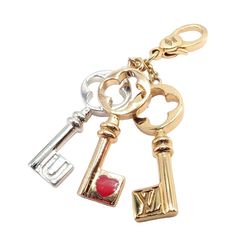 About This Piece: This rare Louis Vuitton charm pendant features three keys, each crafted from 18k gold in three distinct colors: yellow, white, and rose. The rose gold key is elegantly adorned with red enamel to form a heart shape, showcasing LV's exqmbolic pieuisite attention to detail. A luxurious and syce, it embodies love and sophistication. Metal: 18k Yellow, Rose, and White Gold  Size: 38mm Total Each key is 8mm wide  Weight: 5.4 grams  Hallmarks: LV 750   Please refer to the dimensions in the description above for accurate measurements. Please reach out to the seller with any questions on dimensions or fit prior to purchase. Luxury Yellow Gold Pendant Charms, Luxury Gold Jewelry With Keys, Luxury Removable Charms For Gifts, Luxury Yellow Gold Charms With Removable Details, Luxury Yellow Gold Charms With Removable Features, Luxury Yellow Gold Charms With Removable Pieces, Luxury White Gold Charms For Gift, Luxury Gold Charms With Removable Details, Luxury Gold Charms With Removable Feature