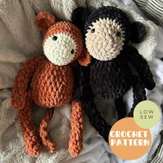 two crocheted stuffed animals laying next to each other