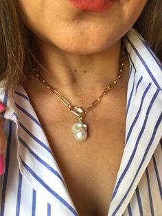 This handmade 16 inch Choker Baroque Pearl Pendant is trending right now! Versatile, you can add or remove pendant and simply wear it as a gold paperclip chain necklace, perfect for layering! Pls see last photo for layering guide. The Baroque or flameball cultured freshwater dangling pearl is large, white, lustrous, AA quality pearl, measures 18mm x 22mm, attached to a gold filled peg, detachable.  The paper clip chain link is rounded oval, gold filled, brass body.  The carabiner screw lock is g Unique Chain Necklace With Lobster Clasp Gift, Gold Baroque Pearl Chain Necklace Gift, Chic Gold Paperclip Jewelry, Baroque Pearl Paperclip Chain Jewelry Gift, Paperclip Chain Necklace As A Gift, Chic Handmade Chain Necklace Gift, Chic Handmade Chain Necklace For Gift, Gold Necklace With Baroque Pearl And Paperclip Chain, Baroque Pearl Chain Necklace As Gift