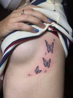 Butterfly Tattoo underboob under breast Follow🦋🤍 | Creative Tattoos Aesthetic By  Alayna Hanson Underboob Tattoo Butterfly, Thigh Tattoo Butterfly, Underboob Butterfly Tattoo, Butterfly Underboob Tattoo, Tattoo Thigh Women, Small Medusa Tattoo, Butterfly Thigh Tattoo, Font Tato, Rib Tattoos For Women