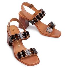 Tory Burch Women's DELANEY Embellished Leather Block-Heel Sandals

 * Style No# 71712
 * Color: TAN
 * Leather upper
 * Round square toe
 * Adjustable buckle closure
 * Duel strap
 * Embellished detail
 * Leather lining
 * Padded insole
 * Wrapped heel, 3" (75mm)
 * Leather sole
 * Size: 9.5
 * BRAND NEW WITH BOX
 * 100% AUTHENTIC

*Please note that the color in pictures might differ slightly due to lighting, flash and screen resolution.

----------------------------------------

----------------------------------------

INTERNATIONAL POLICY

We accept Paypal payment only. Items will be shipped with in 1 business day from date of receiving payment. We ship via USPS. If you would like to purchase more than 1 item please email us for rate.

INTERNATIONAL BUYERS NO RETURNS

International bidd Leather Block Heels, Sandal Fashion, Block Heels Sandal, Colorful Pictures, Karl Lagerfeld, Tan Leather, Block Heels, Tory Burch, Sandals Heels