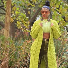 This Is A Quality Kiwi Green Maxi Sweater; Not The Cheap Version. Its 100% Acrylic. It Has A Cable Sweater Design. This Sweater Is Heavy Enough To Keep U Warm In Colder Climate. Model Is Wearing A Small With 3 Inch Heels. Casual Green Cable Knit Sweater Coat, Fitted Long Green Outerwear, Trendy Long Green Outerwear, Green Cable Knit Winter Outerwear, Winter Green Cable Knit Outerwear, Spring Green Cable Knit Sweater Coat, Fitted Green Cable Knit Cardigan, Fitted Cable Knit Outerwear For Layering, Chic Green Knit Outerwear