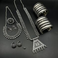 Traditional Silver Sets As Gift, Traditional Silver Sets For Gifts, Silver Festive Sets For Navratri, Silver Sets For Navratri Festival, Silver Temple Jewelry Sets For Festivals, Navratri Themed Motif Jewelry Gift, Silver Sets For Festivals, Traditional Silver Sets For Navratri, Silver Heavy Sets For Diwali