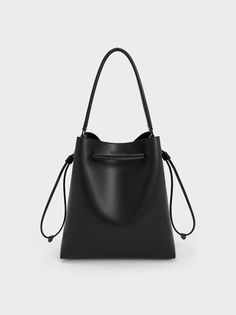 Jet Black Drawstring Hobo Bag | CHARLES & KEITH Charles And Keith, Belt Ring, Brand Collaboration, Size Chart For Kids, Charles Keith, Daily Essentials, Printables Kids, Everyday Bag, Sustainable Materials