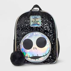 Create some fun for your kid with The Nightmare Before Christmas 11-Inch Flip Sequin Backpack. This black and white backpack features Jack Skellington's face in white at the front and allover flip sequins to elevate the look. It's designed with a large interior compartment, exterior bottle holder and accessory pocket to help provide enough space for their belongings. Showcasing a woven design, this mini backpack allows easy carrying with the top handle and backpack straps. Nightmare Before Christmas Kids, The Nightmare Before Christmas Decorations, Jack Skellington Faces, Dollar Tree Gifts, Cinch Sack, Sequin Backpack, White Backpack, Stylish Backpacks, The Nightmare Before Christmas