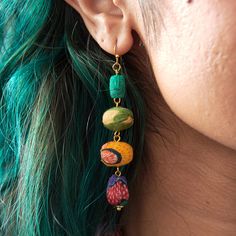 A linear arrangement of Kantha beads in oval, barrel and teardrop shapes dangle fluidly to form this unique style. Crafted from repurposed Sari and Kantha fabric, each is one-of-a-kind and colors and patterns will vary. Finished with nickel-free and lead-free post earring backs. Sustainably handmade by women artisans in India Kantha Fabric, Local Gifts, Art Earrings, Textile Jewelry, Free Post, Women Artisans, Leather Earrings, Earring Backs, Post Earrings