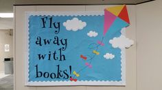 May Library Bulletin Board Ideas, Spring Library Bulletin Board Ideas, Kite Bulletin Board Ideas, Spring Library Bulletin Boards, Reading Picnic, Rainbow Bulletin Boards, Reading Corner Classroom, School Library Decor