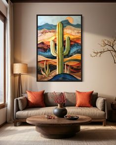 a living room with a couch, coffee table and painting on the wall above it