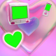 a heart shaped object with a computer monitor in the shape of a heart and a cell phone