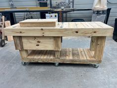 a workbench made out of pallet wood