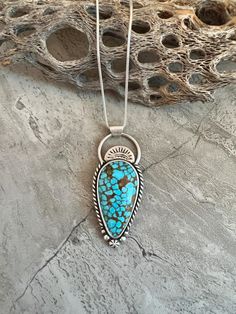 Beautiful Kingman Turquoise pendant set in sterling silver.   The intense color of the stone is everything you want in turquoise and the golden red brown polychrome webbing is a Kingman favorite, as well as one of their highest quality stones. The Kingman Turquoise Mine in Arizona is one of the oldest and longest running turquoise mines in the US. It is famous for its beautiful sky blue colors in various shades, as well as different colors of matrix.  Kingman stabilizes all of their turquoise be Southwestern Sterling Silver Turquoise Necklace With Large Stone, Bohemian Turquoise Necklace With Large Sterling Silver Stone, Artisan Turquoise Necklace With Inlay, Turquoise Pendant Necklace With Inlay, Southwestern Sterling Silver Turquoise Cabochon Necklace, Collectible Turquoise Sterling Silver Necklace, Collectible Sterling Silver Turquoise Necklace, Collectible Sterling Silver Turquoise Gemstone Necklace, Turquoise Sterling Silver Amulet Jewelry