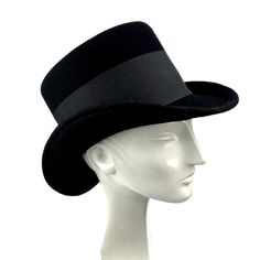 Black topper hat in pork pie style medium height. Edwardian and victorian top hat ideal for special occasions such as weddings, cocktails or parties. You can make your hat with your favorite color by choosing it from my Wool felt color card. Measurements in centimeters are 31 x 25. Crown height 12. Brim length 6.5. These measurements may have some slight variation depending on the size of the hat. The end of the brim is reinforced inside with a fine wire covered with cotton thread to always have Top Hat Side View, Classic Adjustable Felt Top Hat, Black Brimmed Top Hat For Cosplay, Black Adjustable Vintage Top Hat, Classic Wide Brim Top Hat, One Size, Vintage Black Handmade Top Hat, Victorian Top, Mens Straw Hats, Card Measurements