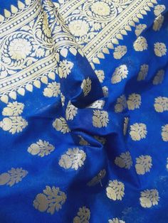 Dupatta length: 2.40 m Dupatta width: 0.9 m Blended Dry clean This dupatta is made of finely woven fabric and is decorated with intricate design and engravings Banarasi dupattas are characterised by brocade borders & pallus. They often have woven buti or jall on the body Luxury Blue Tussar Silk Dupatta, Gold Unstitched Katan Silk Anarkali Set, Gold Bollywood Anarkali Set In Katan Silk, Semi-stitched Gold Anarkali Set In Katan Silk, Blue Katan Silk Lehenga With Dupatta, Gold Katan Silk Anarkali Set With Zari Weaving, Gold Katan Silk Anarkali Set With Traditional Drape, Gold Semi-stitched Katan Silk Anarkali Set, Blue Banarasi Silk Dupatta With Pallu