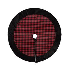 a red and black plaid pattern on a round cushion for the back of a chair