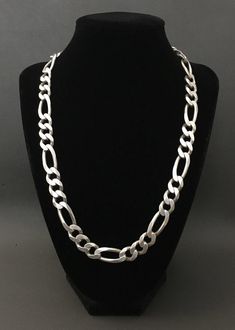 This is classic 925 Sterling Silver Figaro Chain Solid Heavy Necklace.  Very good vintage condition. Necklace stamp the mark "ITALT 925" on clasp. Length: 21" (53 cm) length with clasp;   Chain width: 11 mm Weight: 88 grams  Item is exactly as shown in pictures.   Please carefully review the item description and accompanying pictures before making a purchase, as we do not offer a return or exchange policy. If you have any questions or require assistance, please do not hesitate to reach out to us Classic Sterling Silver Figaro Chain Necklace, Classic Silver Figaro Chain Necklace, Classic Link Necklace In Sterling Silver, Classic Necklace With Stamped 925 Link, Sterling Silver Figaro Chain Necklace For Formal Occasions, Classic Hallmarked Chain Link Necklace, Vintage Silver Figaro Chain Necklace, Vintage Silver Figaro Chain Jewelry, Vintage Silver Curb Chain Jewelry