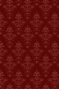 a red wallpaper with an ornate design