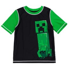 Take a break from crafting buildings and surviving mobs for day of fun at the pool. Dress your little gamer in this cool Minecraft short-sleeve rash guard shirt shorts set designed with green pixelated face Creeper. Made quick-dry material sun-blocking UPF 50+, swim protects child's skin keeps him comfortable as he joins his favorite video game character an adventure packed day. Black Short Sleeve T-shirt For Play, Black Short Sleeve T-shirt For Playwear, Black Short Sleeve Tops For Playwear, Black Short Sleeve T-shirt, Trunks Outfit, Pool Dress, Fabric Tape, Creepers, Pair Of Pants