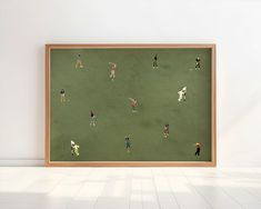 an image of a group of people playing golf on the field in front of a white wall