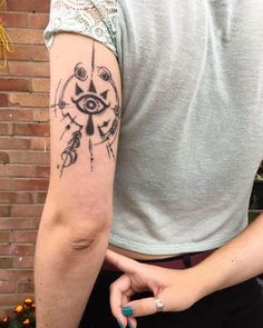 a person with a tattoo on their arm