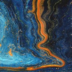 an abstract painting with blue, orange and black swirls on the bottom half of it