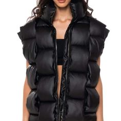 Black Woven Puffer Vest Trendy Black Puffer Vest, Black Vest With Padded Collar For Streetwear, Black Casual Vest With Zipper Closure, Casual Black Vest With Zipper Closure, Edgy Black Vest For Fall, Black Puffer Vest For Spring, Black Winter Vest For Night Out, Trendy Fitted Black Outerwear, Edgy Solid Color Winter Outerwear