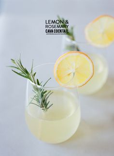 three glasses filled with lemon and rosemary cocktails