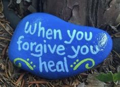 a blue rock with the words when youforgive you heal written on it