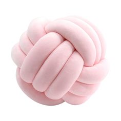 a pink ball that is on top of a white surface and has been made out of foam