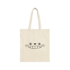 This 100% cotton bag comes in one size - 15" x 16"- perfect for everyday wear. While the canvas material will show off your designs in great colors, it's durable and will last for years. The bag features 20" handles (made from the same canvas), making it easy to carry even with a week's worth of shopping. .: 100% cotton canvas .: Heavy fabric (12 oz/yd² (406.9 g/m .: Sewn-in label Reusable Cotton Travel Bag, Cotton Reusable Travel Bag, Everyday Reusable Cotton Bags, White Reusable Canvas Bag, Beige Reusable Canvas Bag, Everyday Reusable Cotton Shoulder Bag, Eco-friendly Reusable Cotton Shoulder Bag, Eco-friendly Cotton Reusable Shoulder Bag, Eco-friendly Reusable Cotton Bag