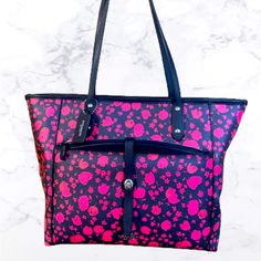 Navy Blue Leather Coach Tote With Pink Flowers. Never Been Used. Smoke Free Pet Free Home. This Nwt Coach City Tote In The Prairie Calico Floral Print Is A Stylish Addition To Any Woman's Wardrobe. The Bag Features A Black Handle/Strap And A Pink Exterior Color, Making It Perfect For Both City And Casual Use. The Tote Is Made Of Canvas Material And Has A Beautiful Pattern That Will Attract Attention. The Bag Comes With A Pouch And Has Black Lining Inside. It Is A Perfect Fit For Women Who Love T Pink Coach Bag With Zipper Closure, Pink Bag With Removable Pouch For On-the-go, Pink Pouch Shoulder Bag For On-the-go, Pink Pouch Bag For On-the-go, Coach Pouch Shoulder Bag With Zipper Pocket, Pink Coach Shoulder Bag For Daily Use, Coach Bags With Zipper Pocket For Shopping, Coach Pink Pouch Shoulder Bag, Pink Tote Shoulder Bag With Zipper Pocket