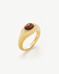 Savi Sculptural Gemstone Stacking Ring | 18ct Gold Plated Vermeil/Tiger's Eye. Pared-Back Modern Meets Vintage. This Sculptural Stacking Ring is Embellished with a Raised Tiger's Eye Oval Cabochon Gemstone. Team with Chunkier Rings for a Standout Ring Stack. A Collection Designed in Collaboration with the Beijing-Born Tastemaker Behind Savislook, Inspired by Architecture and Organic Forms. Metal: 18Ct Recycled Gold Plated Vermeil on Recycled Sterling Silver Gemstone: Tiger's Eye Dimensions: 8. 1 Black Agate Ring, Gemstone Stacking Ring, Organic Forms, Ring Stack, Chunky Rings, Agate Ring, Tiger Eye Stone, Eye Stone, Recycled Gold