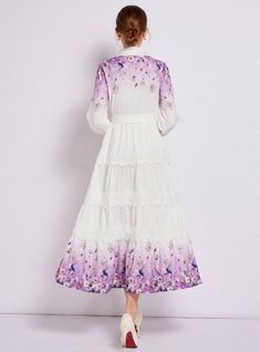 Captivating and ethereal, this enchanting long-sleeved dress is a portrait of bucolic elegance. Its fitted bodice descends into a gently tiered skirt, creating a silhouette that’s both classic and whimsical. The crisp white fabric serves as a canvas for delicate floral patterns that bloom across the hem, lending a touch of springtime regardless of the season. Lace trims add a sophisticated touch, framing the neckline and cuffs with exquisite detail. With a cinched waist accentuated by a self-tie belt, this dress shapes a figure that is both graceful and poised. It’s a versatile piece that transitions seamlessly from a countryside stroll to a chic urban evening. Fabric name: polyester fiberPattern: printingSkirt length: long skirtSkirt type: large swing typeSleeve length: long sleevesColor: Lapel Dress, Soft Lavender, Antique Fashion, Lace Trims, Sleeved Dress, Dress Shapes, Charm Set, Tiered Skirt, Cinched Waist