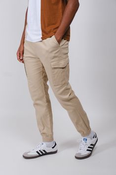 The Cargo Pocket Twill Jogger will be your new favorite pants to add to your wardrobe rotation. These joggers offer both comfy and durable styles. The fit is relaxed. Details include Pocket Twill Cargo Joggers, side pockets and elasticated drawstring waist Style: BFMI063F Sporty Bottoms With Cargo Pockets For Everyday, Athleisure Cargo Pants For Everyday, Casual Tapered Leg Cargo Pants, Utility Cargo Style Sweatpants With Tapered Leg, Casual Relaxed Fit Cargo Pants With Hip Pockets, Casual Parachute Pants With Side Pockets And Tapered Leg, Relaxed Fit Parachute Pants With Hip Pockets, Relaxed Fit Athleisure Parachute Pants With Hip Pockets, Athleisure Parachute Pants With Hip Pockets And Relaxed Fit