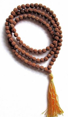 each bead around 8mm diameter, for the total length around 31 to 32 inches each bead around 10mm diameter, for the total length around 41 to 42 inches each bead around 12mm diameter, for the total length around 47 to 48 inches Large long 108 Rudraksha Bodhi seed (one type of very hard Bodhi seed) Buddhist prayer beads mala necklace from Nepal, each bead around 8mm diameter, for the total length around 31 to 32 inches. 108 is an important number in Buddhism because one must overcome 108 evils to Nepal Jewelry, Tibetan Mala, Gem Beads, Rudraksha Mala, Yoga Mala, Meditation Prayer, Beads Mala, Amber Gemstone, Toggle Bracelet