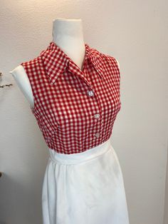 "1970's Gingham Butterfly Maxi Dress - wounded This is such a fantastic summer dress. The bodice is an empire waist with a red gingham button front style. But it has a zipper in the back. The skirt is white and has a butterfly in the lower hem. This dress has a flaw, maybe you don't mind? Measurements provided are flat and have been doubled. Bust 35\" Waist 27\" Hips 40\" Length 54.5\" ❤️ Condition: Great vintage condition woth a cosmetic flaw. Through out the skirt there are what looks like gra Retro Gingham Vintage Dress, Summer Gingham Dress With Button Closure, Summer Plaid Vintage Dress, Plaid Vintage Summer Dress, Vintage Gingham Dress For Spring, Gingham Vintage Dress For Spring, Vintage Button Dresses For Picnic, Vintage Buttoned Dresses For Picnic, Spring Vintage Gingham Dress