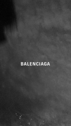 a black and white photo with the word balencia in it's center