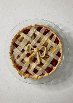 a pie sitting on top of a glass plate