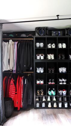 a closet filled with lots of clothes and shoes