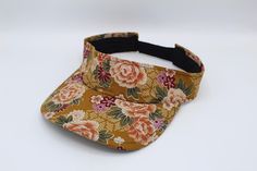 a floral print visor with black band