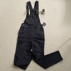 Classic Silhouette, Detailed With Dual Straps And Center Patch Pocket For These Straight-Leg Overalls. Buttons At Sides Adjustable Straps Two Pockets At Sides Patch Pocket At Center 98% Cotton/ 2% Elastane Machine Wash Cold Black High Waist Jumpsuits And Rompers With Pockets, Black High-waist Jumpsuits And Rompers With Pockets, Black Overalls For Spring, Black Spring Overalls, Casual Fitted Black Overalls, High Rise Black Overalls For Spring, Black Fitted Casual Overalls, Black Overalls For Fall, Black Overalls For Workwear